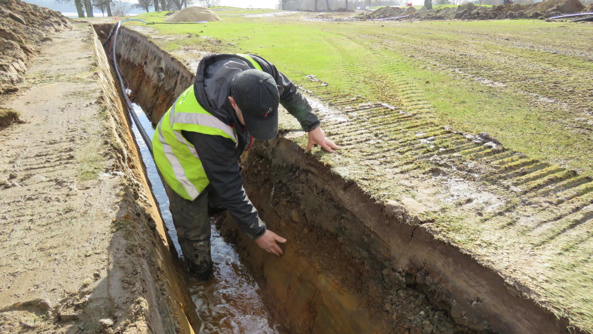 This drainage trench shows just how high the water table is and the poor quality of the subsoil.jpg