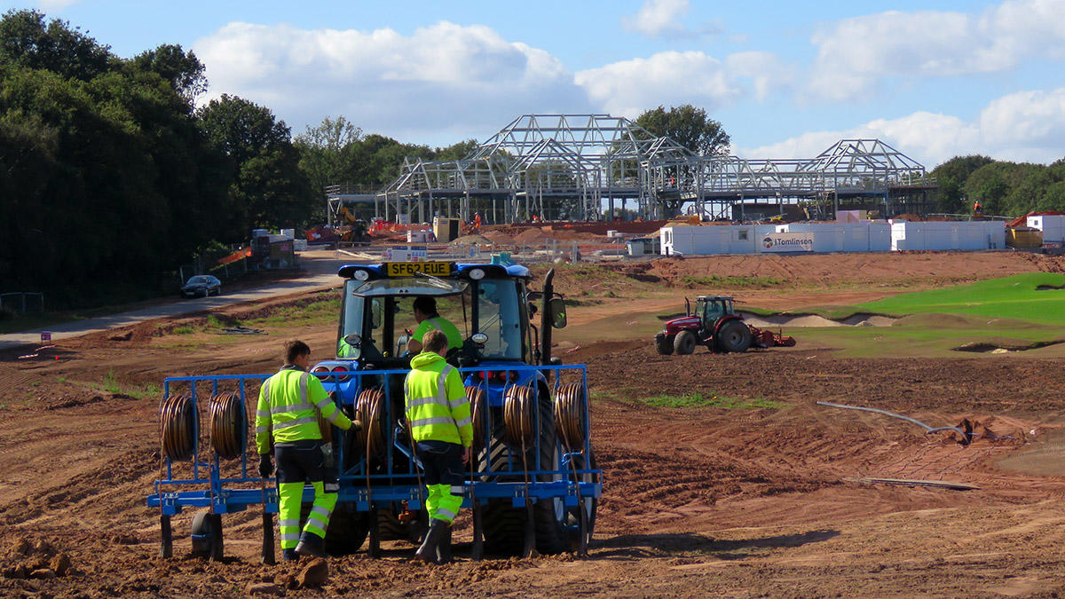 A team laying fairway drainage pipes 2.jpg