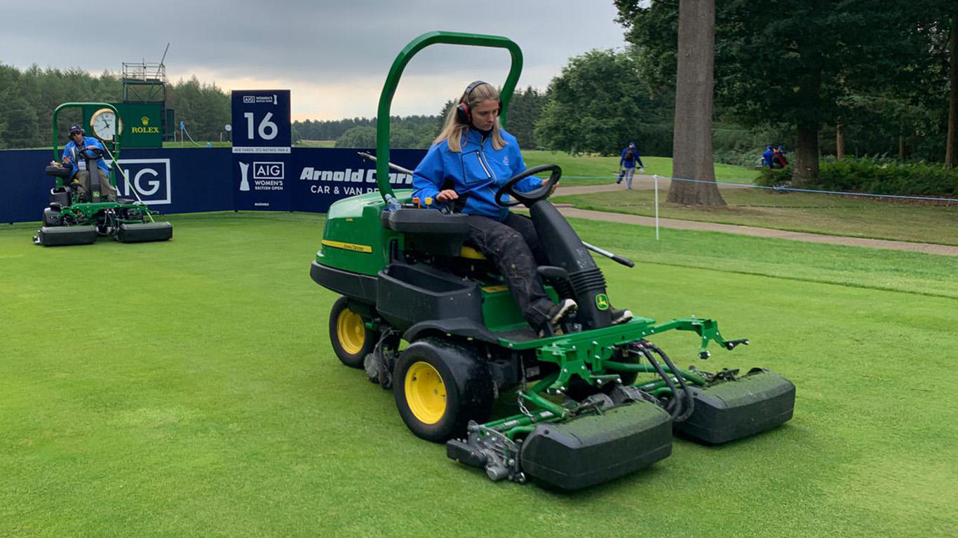 Chloe Gallagher mowing tees ahead of the day's play WEB.jpg