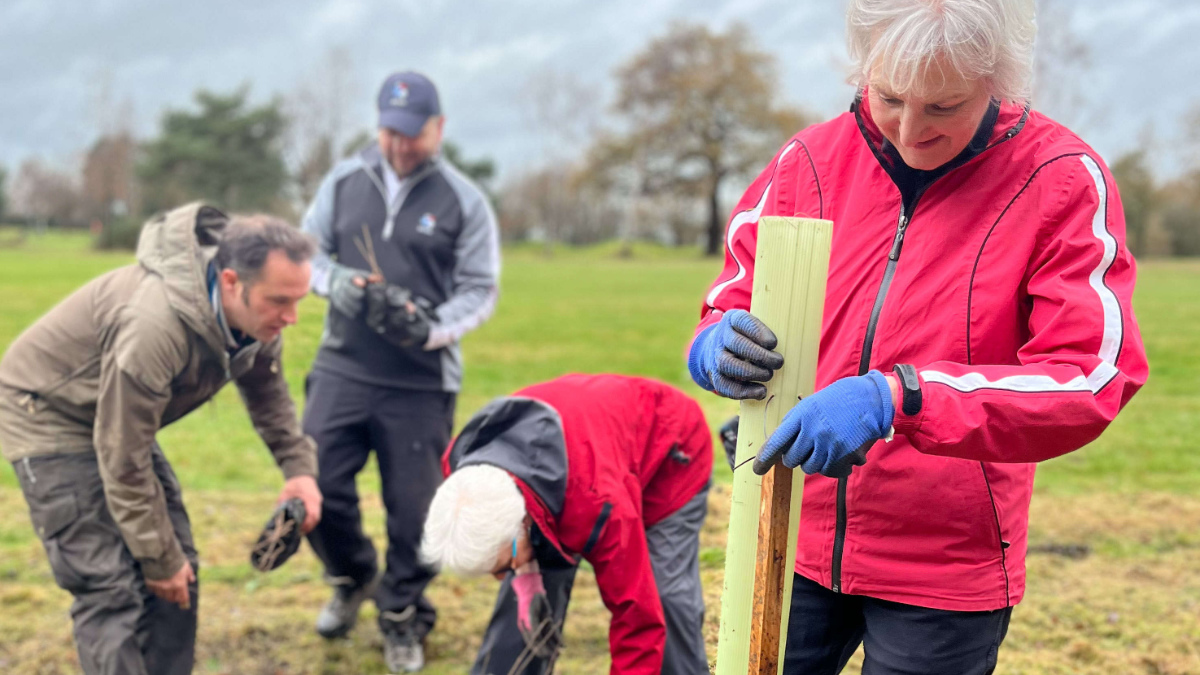 Harrogate Golf Club members joined Head Greenkeeper Ken Ward (left) in planting the trees.jpg