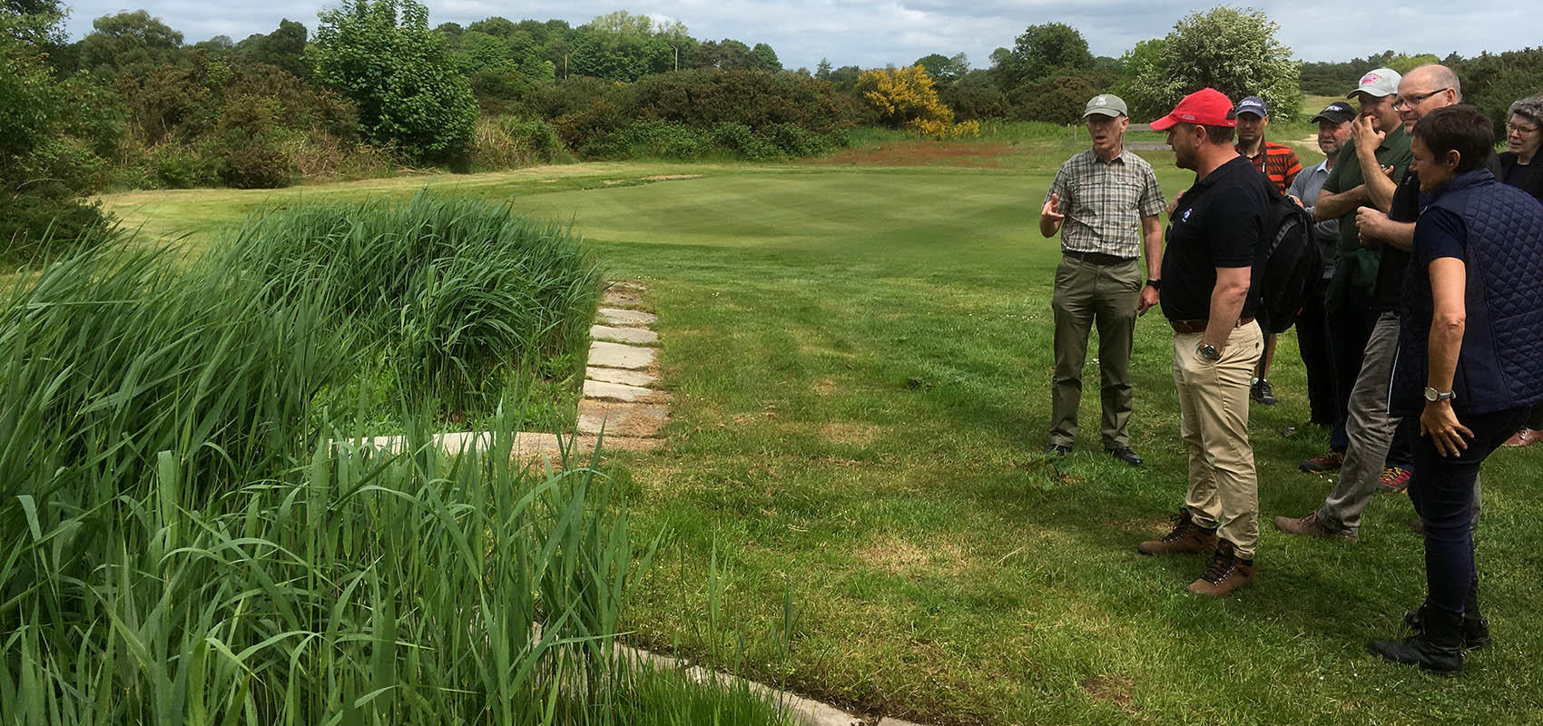 Mark Broughton explains reed bed management.jpg