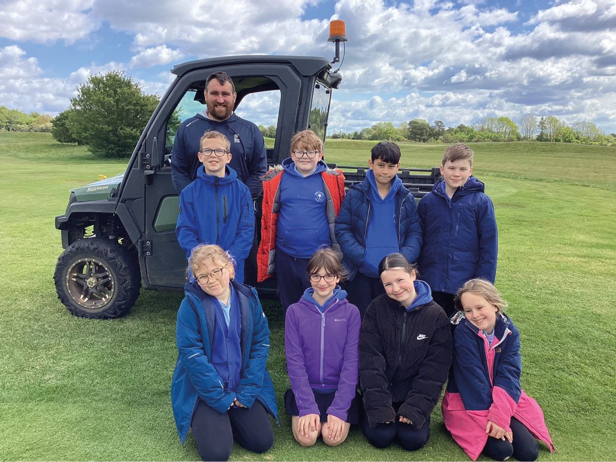 Paul Fowkes with primary school pupils.jpg