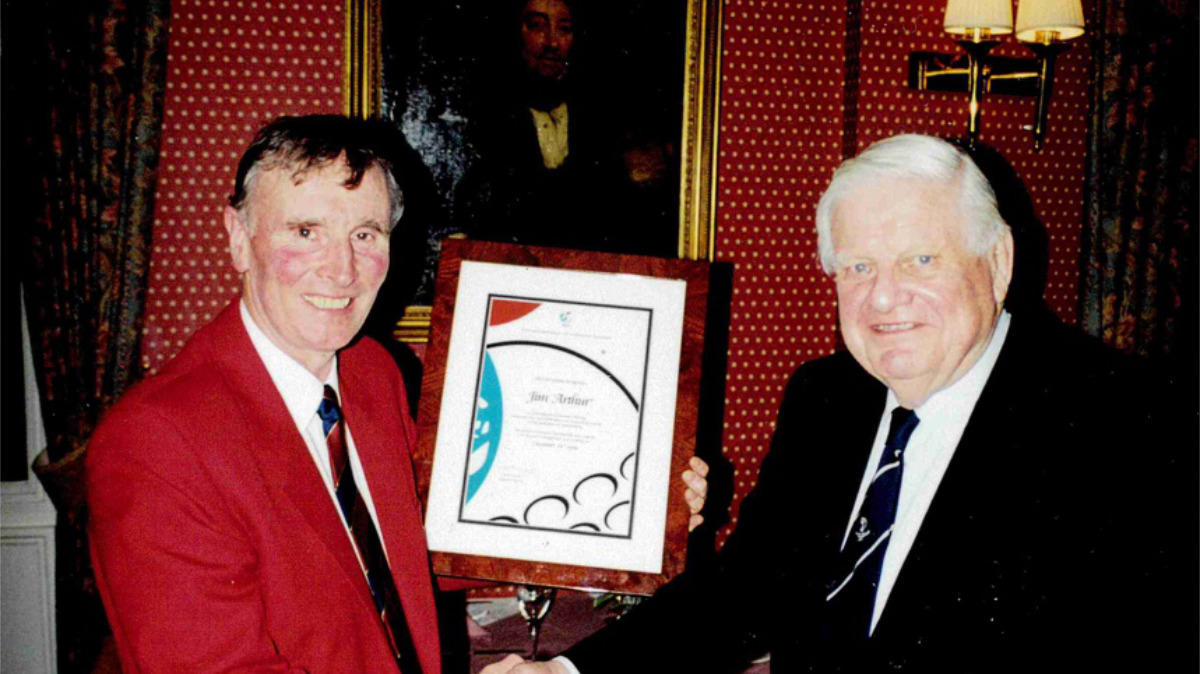 Jim was presented with a certificate in recognition of his contribution to the industry by BIGGA Chairman Elliott Small in 2000.jpg