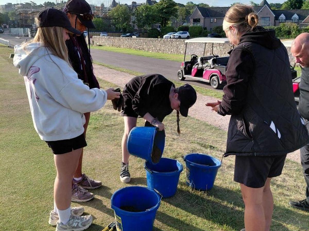 Preparing Divot Mix at the Old Course.jpg