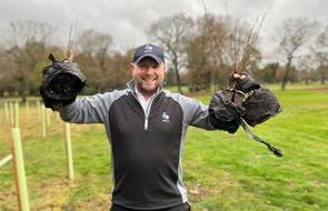 BIGGA's ecology expert James Hutchinson showcasing some of the saplings.jpg