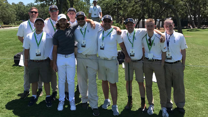 Tommy Fleetwood and TPC Sawgrass volunteers.jpg