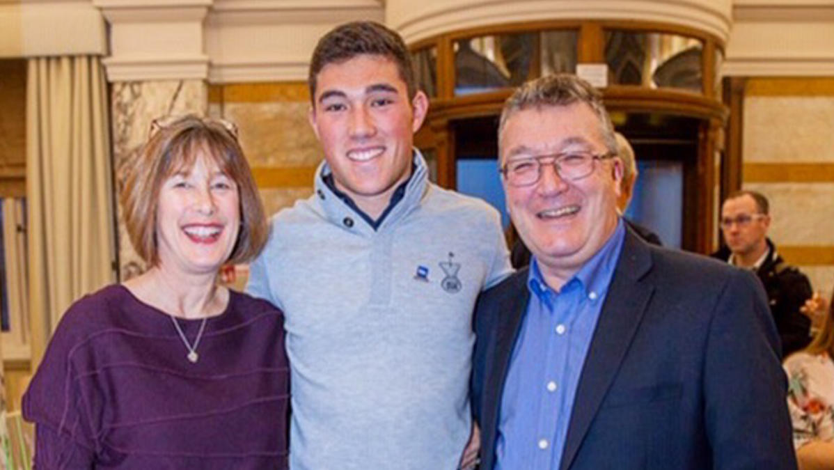 Cameron Campbell with mum Claire and dad Andy.jpg