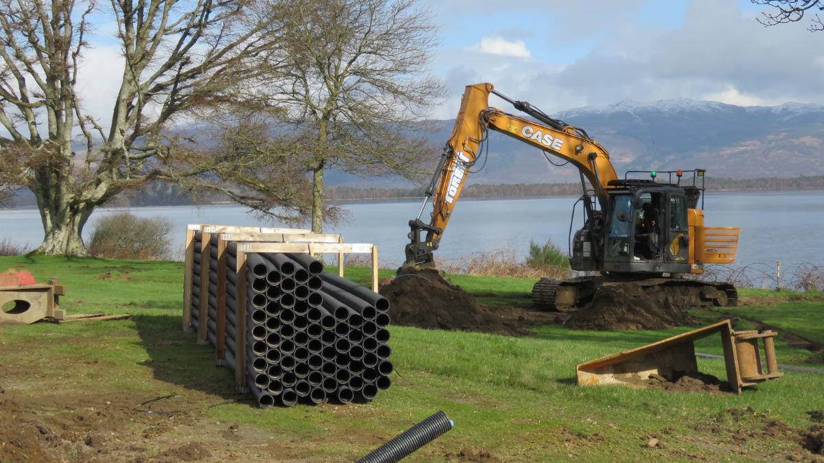 Fitting drainage pipes at Loch Lomond.jpg